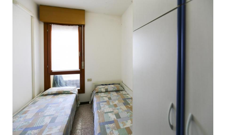 résidence LE ZATTERE: C6 - chambre avec deux lits (exemple)